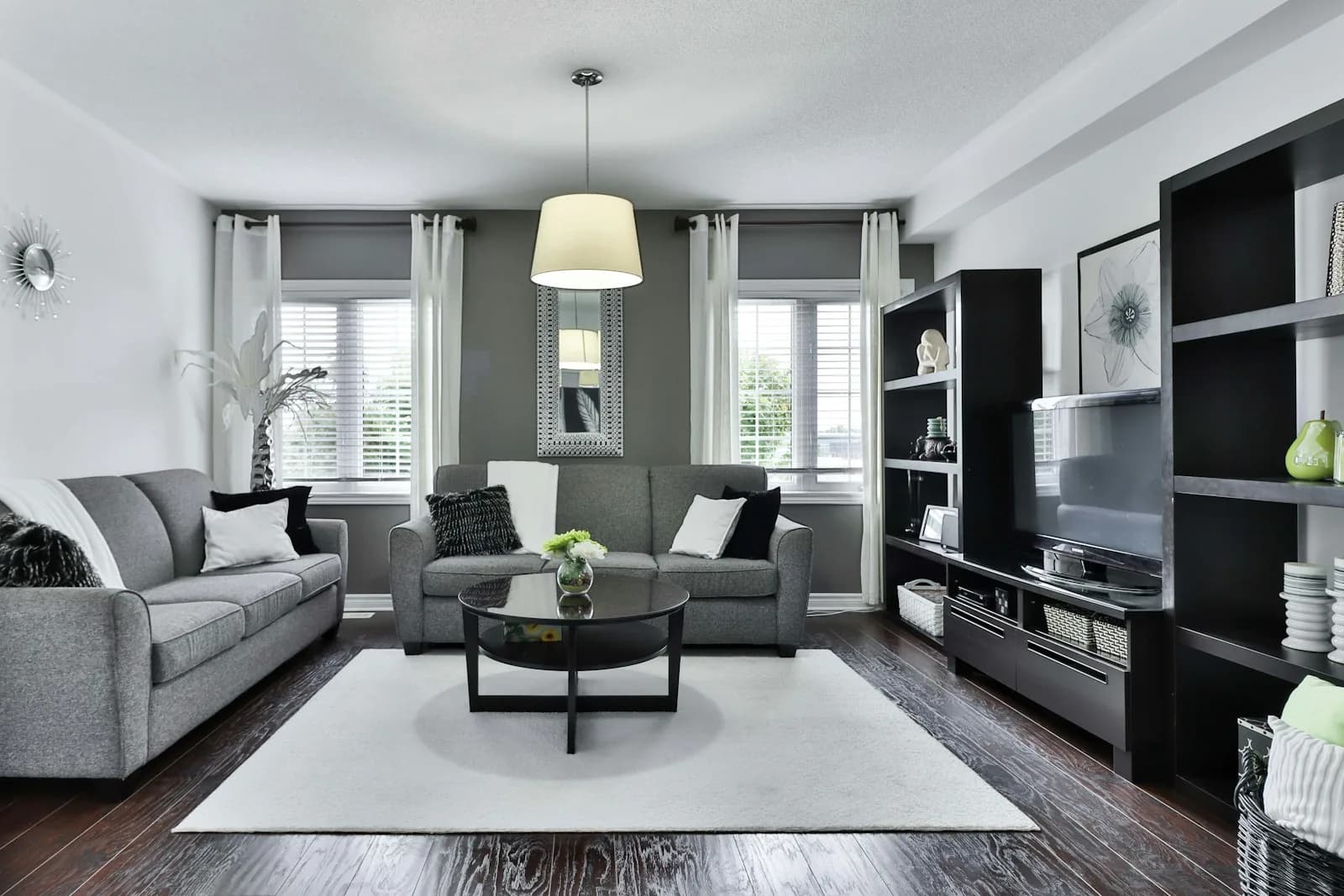Spacious open-plan living and dining interior with natural light—residential project style